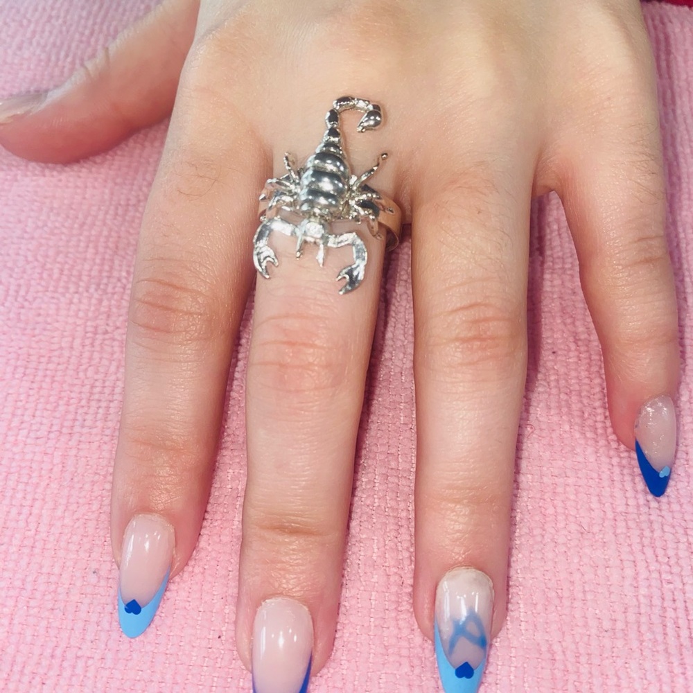 Elegant Silver Ring with Intricate Scorpion Design